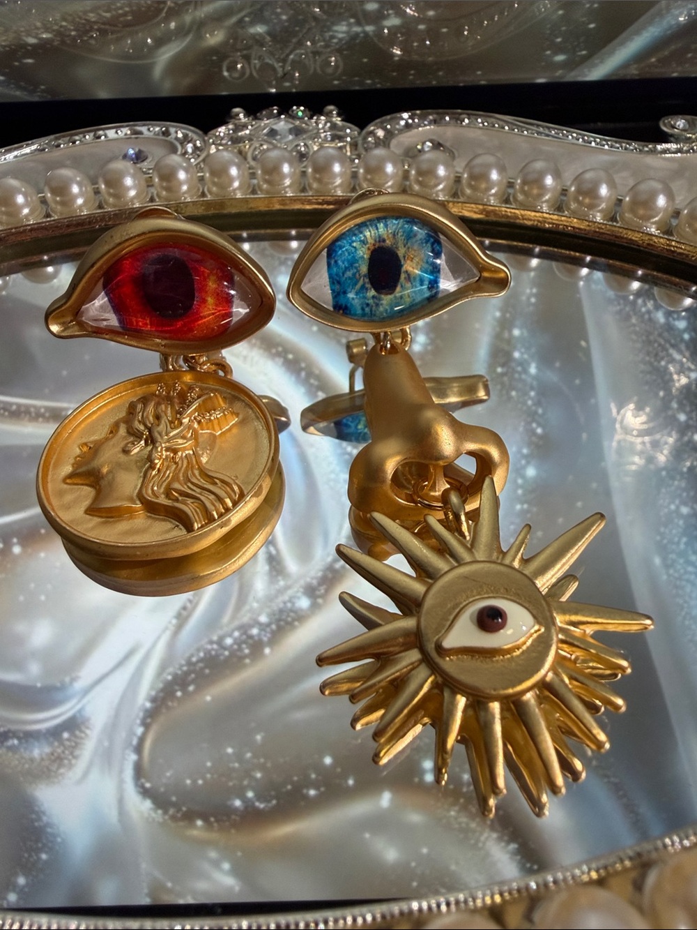 Gold-Tone Asymmetrical Eye Drop Earrings with Blue and Red Accents